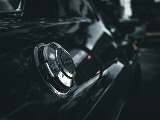 A black car's gas tank 