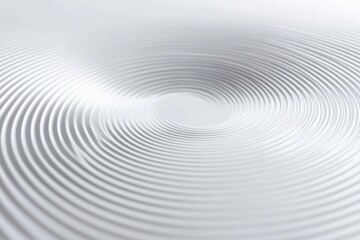 Abstract white concentric circles create a calming and mesmerizing visual effect.