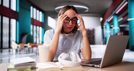 Tired Student Studying To Become Medical Doctor