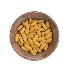 pills in wooden bowl isolated