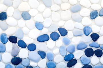 Fototapeta premium White And Blue Pebbles Under Clear Water Overhead Shot