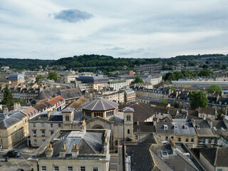 Obraz premium High Angle View of Historical Bath City of England United Kingdom During Mostly Cloudy Day of May 26th, 2024, Aerial Footage Was Captured with Drone's Camera During Bright Sunny Day