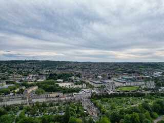 Fototapeta premium High Angle View of Historical Bath City of England United Kingdom During Mostly Cloudy Day of May 26th, 2024, Aerial Footage Was Captured with Drone's Camera During Bright Sunny Day