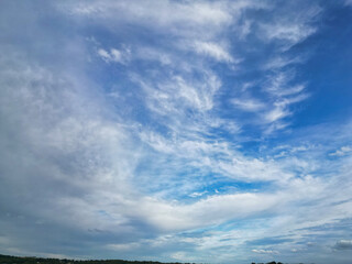 High Angle View of Most Beautiful Clean Sky and Dramatical Clouds over City of England UK. Drone's Camera Footage from High Altitude.