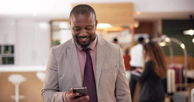 Phone, walking and man in hotel lobby with online chat, booking or check in on business trip. Reception, accommodation and happy businessman with smartphone, typing and mobile app for travel schedule