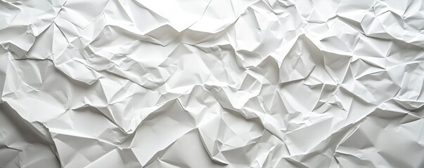 Obraz premium White crumpled paper texture background.
