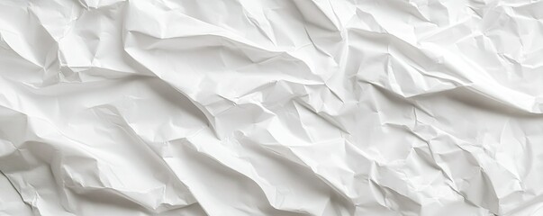 Obraz premium White crumpled paper texture background.