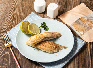 Thai Lime Shufei Snapper fish with red chilli served in plate isolated on napkin side view of taiwan food