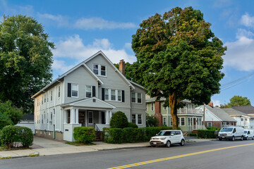 Classic Family Home with Clapboard Siding and Gable Roof in a Charming Faneuil Neighborhood,...