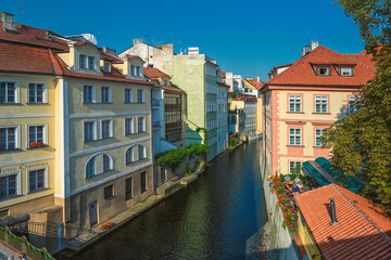 canal running through old European town