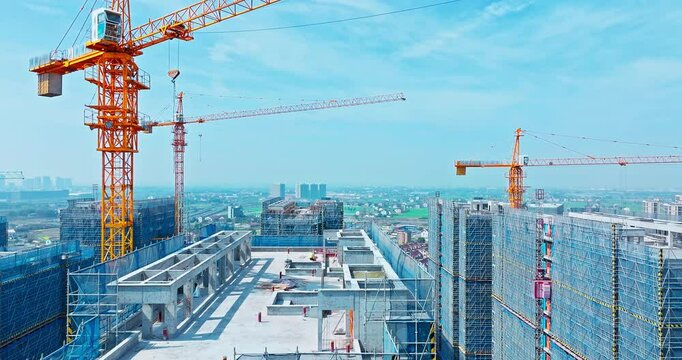 Modern city buildings under construction at construction site