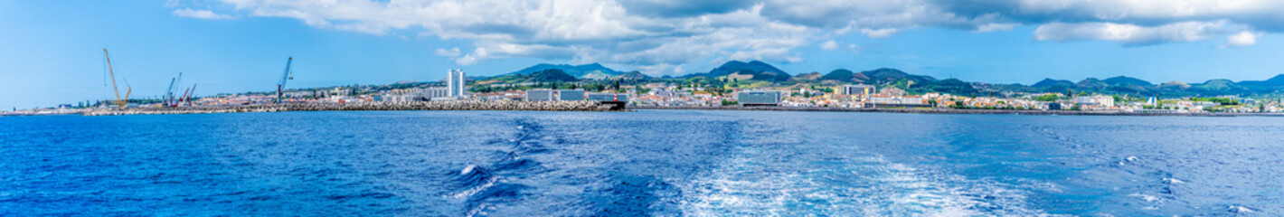 A panorama view along the coast at Ponta Delgada on the island of San Miguel in the Azores in summertime