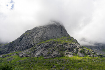 Cloud covered mountain peak in Lofoten island, Norway