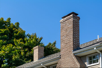 Close-up of the roof and chimney section of a house in Brighton, Massachusetts, USA