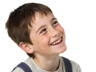 Portrait of a cheerful young boy with freckles and a big smile, isolated on transparent background