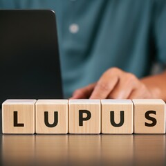 Wooden blocks arranged to spell LUPUS, concept of autoimmune disease awareness, chronic health condition, and medical research displayed on polished wooden surface
