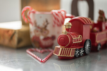 Bed with New Year's decorations. New Year's interior. Christmas tree.