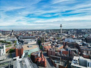 Fototapeta premium High Angle View of Historical and Modern British City Centre of Liverpool, Maritime city in northwest England, United Kingdom. Aerial Footage Was Captured with Drone's Camera on May 5th, 2024