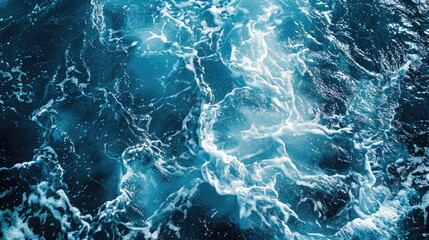Fototapeta premium Abstract top view of sunlit blue water with splashes for graphic design.