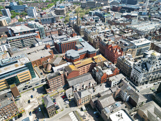 Fototapeta premium High Angle View of Historical and Modern British City Centre of Liverpool, Maritime city in northwest England, United Kingdom. Aerial Footage Was Captured with Drone's Camera on May 5th, 2024