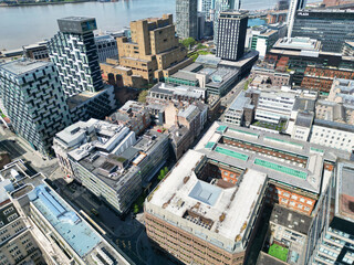 Fototapeta premium High Angle View of Historical and Modern British City Centre of Liverpool, Maritime city in northwest England, United Kingdom. Aerial Footage Was Captured with Drone's Camera on May 5th, 2024