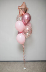 bunch of pink balloons with confetti for birthday