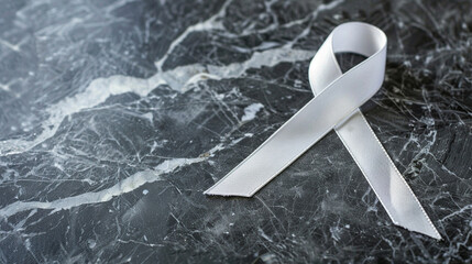 An awareness ribbon for International Albinism Awareness Day. 