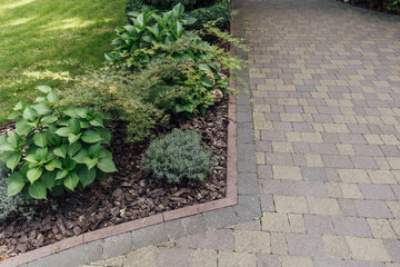 Beautiful summer garden with a walkway winding its way through
