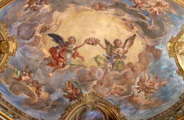 ASTI, ITALY - SEPTEMBER 10, 2024: The fresco of angels with the crown of flowers in the church...