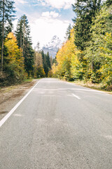snowy mountains and . Caucasus Mountains in winter, Dombay region, Mount Belalakaya. view from the road