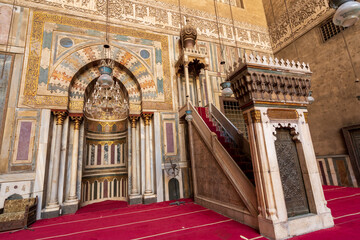 The mihrab and minbar inside the historic Sultan Hassan Mosque and Madrassa in Islamic Cairo, Egypt. 