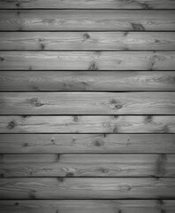 Fototapeta premium Gray wooden planks arranged neatly on a surface in natural light