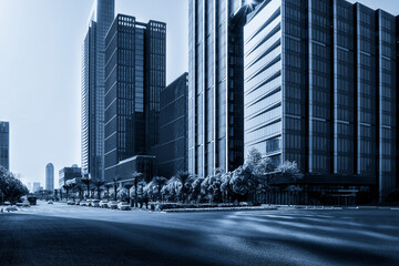 Modern Urban Landscape in Blue Tones Showcasing Skyscrapers and Streets