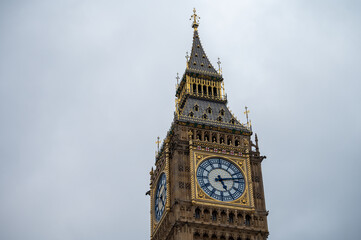Westminster, walking on streets with old houses in spring, city life, Big Ben tower, in London, UK
