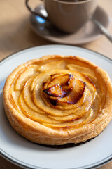 French fresh baked sweet puff pastry with fresh apple fruits in sirup  in confectionery shop