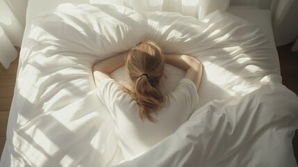 Cozy Morning A Serene Woman Joyfully Relaxing in Bed Under Soft, Inviting Bedding, Embraced by Gentle Sunlight and Tranquility