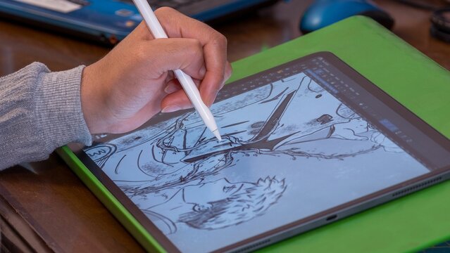 Young Artist Drawing Digital Art on iPad