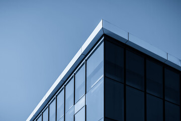 Sleek Modern Glass Building Against a Clear Sky