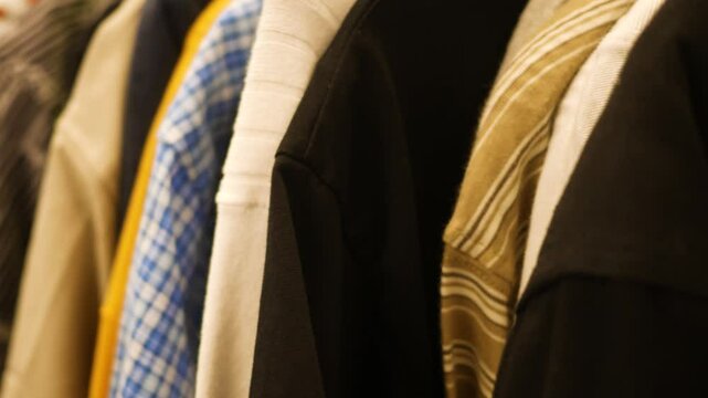 Clothing on hangars in clearance section of department store