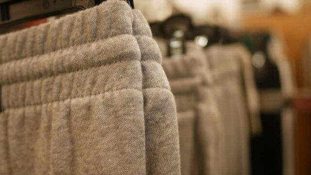Gray Sweatpants hanging in a clothing department store