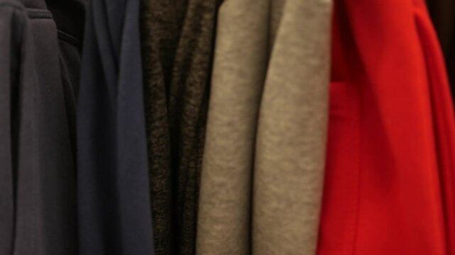 Pants on hangars in clearance section of department store - 3
