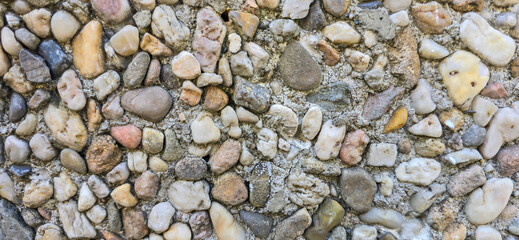 Grunge background of old stone ground texture.
