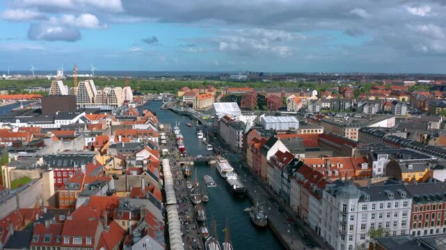 Aerial skyline view of Nyhavn (New Harbour) color houses in Copenhagen, Denmark. Summer cityscape at the famous tourist spot
