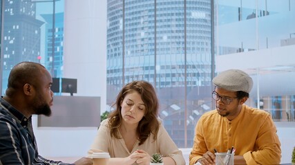 Realtor presenting blueprints to an entrepreneur on an office tour, businessman hunting real estate...