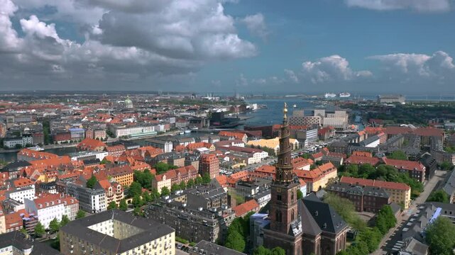 Summer skyline cityscape of Indre By, Copenhagen, Denmark: Christianshavn and Freetown Christiania districts. Wide panoramic aerial view