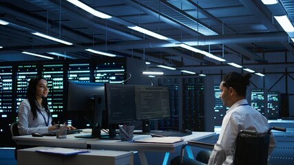 Person with disability in inclusive high tech server room facility ensuring data remains shielded...