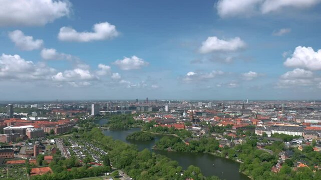 Summer skyline cityscape of Indre By, Copenhagen, Denmark: Christianshavn and Freetown Christiania districts. Wide panoramic aerial view