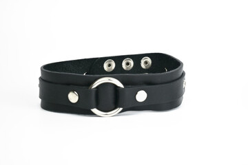 Black leather choker. Isolated on a white background. Space Copy.