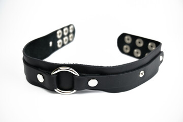 Black leather choker. Isolated on a white background. Space Copy.