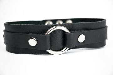 Black leather choker. Isolated on a white background. Space Copy.